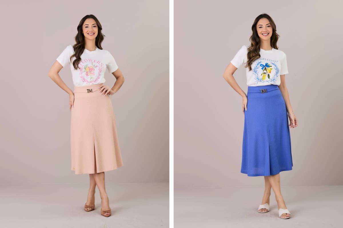 mulher elegante usando blusa e saia midi evase