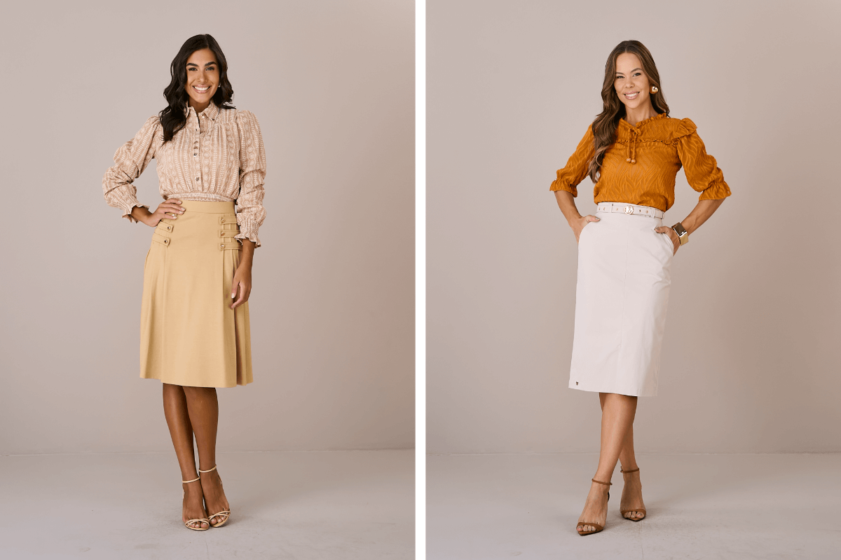 duas mulheres posando para foto com saia midi