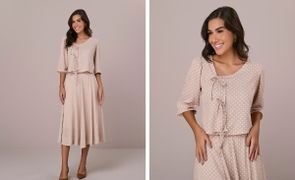 mulher vestida com um conjunto saia e blusa